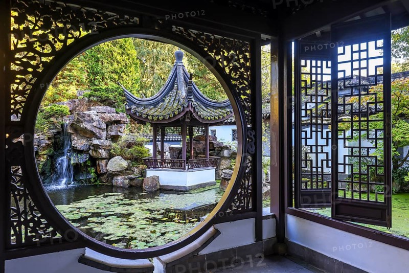 Bochum, North Rhine-Westphalia, Germany - Chinese Garden, Botanical Garden of the Ruhr University Bochum. The Chinese Garden Qian Yuan, built in 1990, is a classical South Chinese scholar's garden and a gift from the partner university, Tongji University in Shanghai. As part of the Ruhr University Bochum, the botanical garden is primarily used for research and teaching, but also for education and public recreation