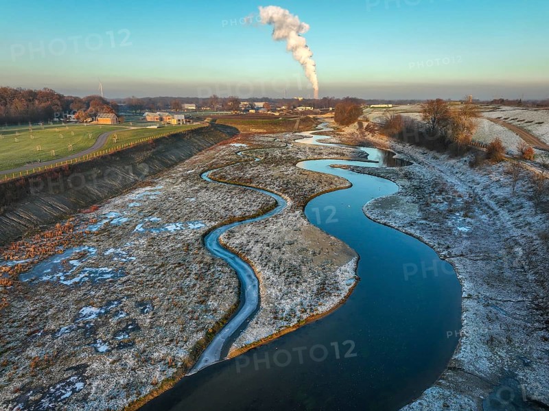 Recklinghausen, Castrop-Rauxel, North Rhine-Westphalia, Germany, winter landscape, EMSCHERLAND construction project, a 37-hectare water and nature discovery park at the water crossroads of the Rhine-Herne Canal and the renaturalised Emscher on the city limits of Recklinghausen and Castrop-Rauxel. The ecological focal point at the confluence of the Suderwicher Bach (left) and Emscher (right) will also be a future garden for the International Garden Exhibition 2027. Before the renaturalisation, the Emscher river system was an open, above-ground wastewater channel, combined sewer with surface water and wastewater. The Uniper power plant Datteln 4 in the background, Europe