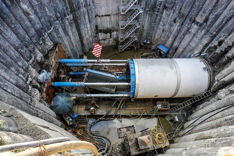 Emscher conversion theme photo, the Emscher system will be sewage-free in 2021 - new construction of a sewer on the Boye, the second largest tributary of the Emscher, during tunnelling the excavated soil is lifted out of the shaft in a lorry and the concrete pipes are grouted, the Boye is renaturalised and transformed into a near-natural body of water, was previously an open, above-ground wastewater sewer, mixed sewer with surface water and wastewater, the ecological conversion of the Emscher system consists of the construction of a central wastewater treatment system in the Ruhr area, the construction of sewers and the renaturalisation of the Emscher and its tributaries, archive photo from 13.11.2014, Bottrop, Ruhr area, North Rhine-Westphalia, Germany, Europe