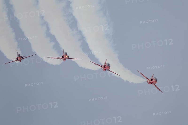 BAE Systems Hawk four aircraft of the RAF Royal air force Red Arrows display team flying, England, United Kingdom, Europe