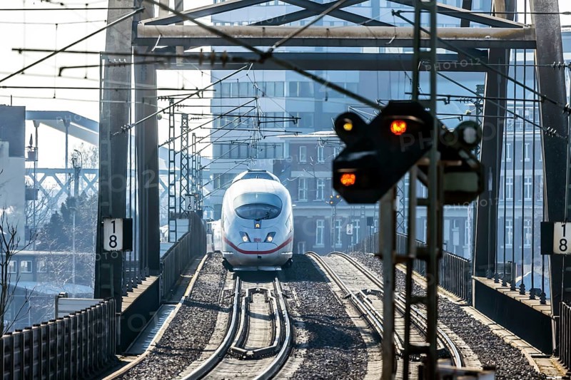 ICE en route on a railway bridge with tracks and signalling system. Mannheim, Baden-Württemberg, Germany, Europe