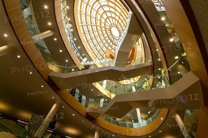 Soaring modern elliptical atrium in the Central Library building, city of Liverpool, England, UK