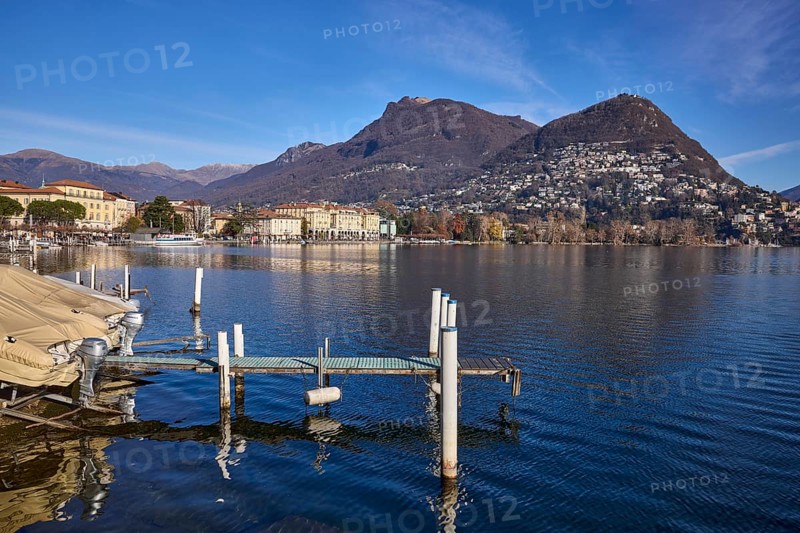 Jetty, motorboat, lake, hill, village, general development, shore, blue sky, cirrostratus clouds, Lake Lugano, Lugano, district Lugano, canton Ticino, Switzerland, Europe