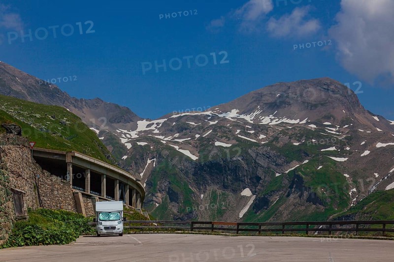 Camper parking at a parking lot at the Grossglockner High Alpine Road, a panoramic road in Austria, in the state of Salzburg. Heiligenblut