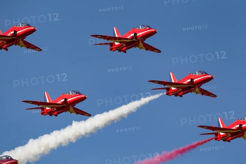 BAE Systems Hawk aircraft of the RAF Royal air force Red Arrows display team flying, England, United Kingdom, Europe