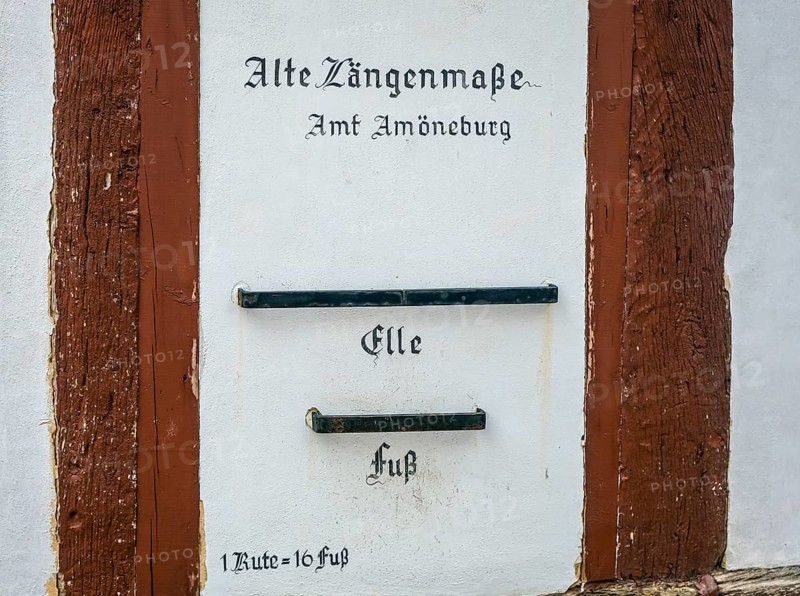 Amoeneburg, Hesse, Germany, The length measurements of ELLE and FUSS are displayed on the façade of the Amt Amoeneburg town museum. Amöneburg is a small town in the district of Marburg-Biedenkopf in central Hesse. It lies on the 365 metre high Amöneburg mountain with Amöneburg Castle at the summit, Europe