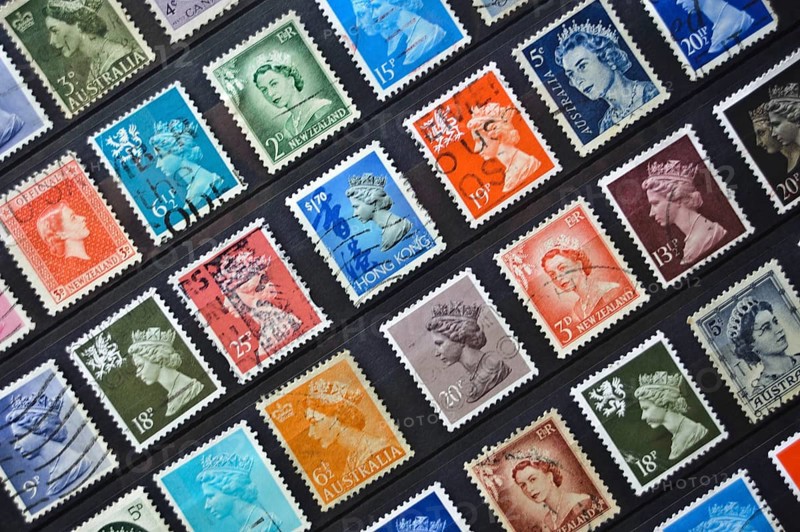 Old postage stamps from various english speaking countries, they depict the queen Elizabeth II. These countries belong to the Commonwealth