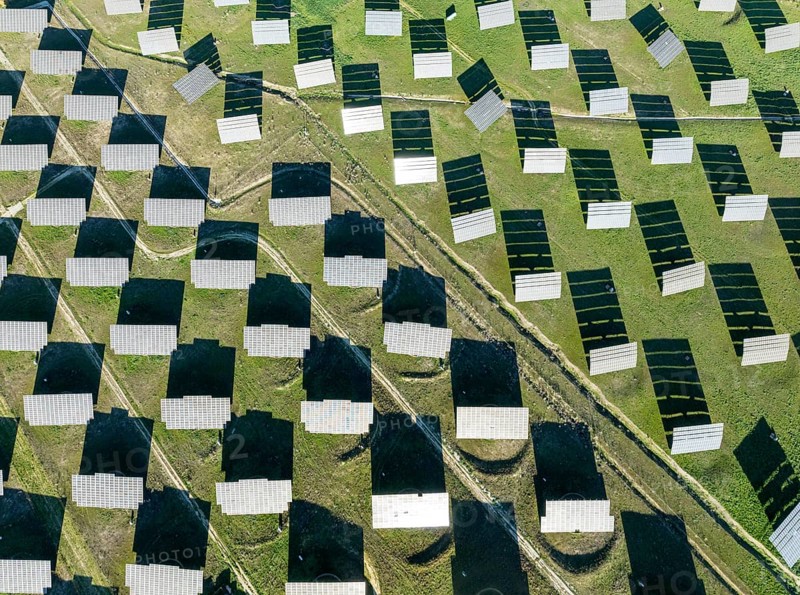 Rows of solar panels at a photovoltaic plant near town of Espejo. Aerial view. Drone shot. Córdoba province, Andalucía, Spain, Europe
