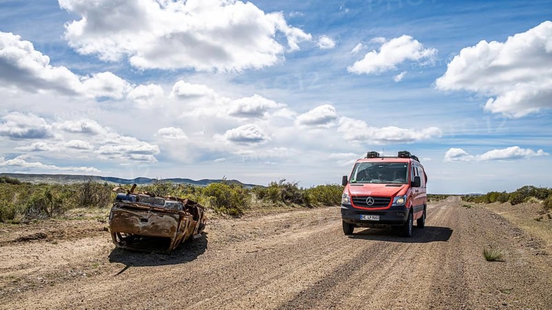 Car wreck along the road near Estancia la Maciega, Chubut, Argentina, South America