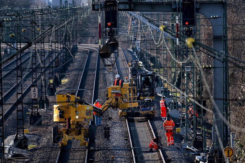 Labourers working with Liebherr A922 Rail Litronic and Kuhnle RR14 EVO 3 Rail two-way working platform on rails, line closure, construction site implementation Digital node between Waiblingen and Bad Cannstatt, Stuttgart, Baden-Württemberg, Germany, Europe