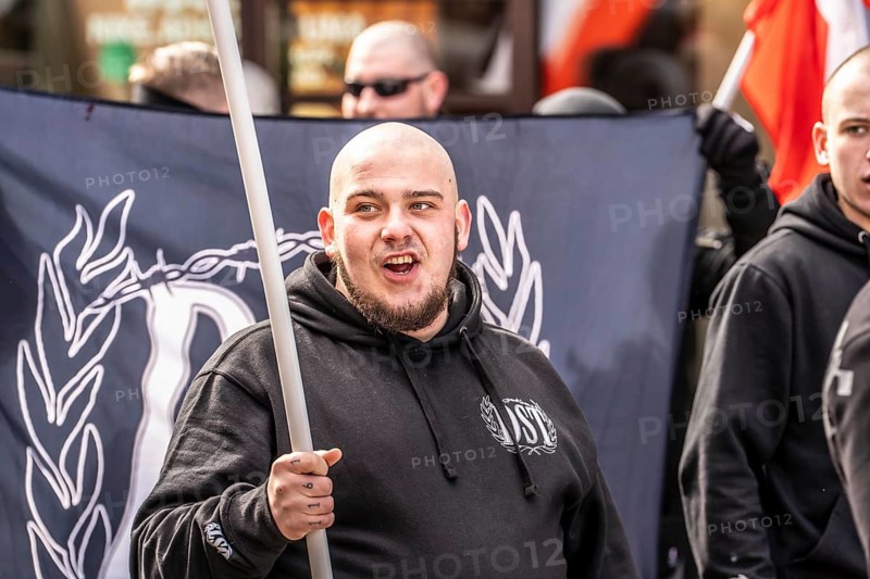 The neo-Nazi group Jung und Stark, JS, demonstrates in the city centre of Essen, demanding the remigration of foreigners, chanting Deutschland den Deutschen Ausländer raus, approx. 150 ultra right-wingers, dressed in black and wearing typical scene clothing, several groups demonstrate against the Nazi march, Essen, North Rhine-Westphalia, Germany, Europe
