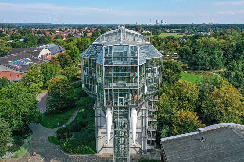 Hamm, North Rhine-Westphalia, Germany - The Maximilianpark in the Westphalian city of Hamm is a leisure park that has been built on the site of the disused Maximilian colliery since the 1984 State Garden Show and whose landmark is the glass elephant, a walk-in sculpture around 40 metres high. The Uniper power station Datteln 4 is in the background
