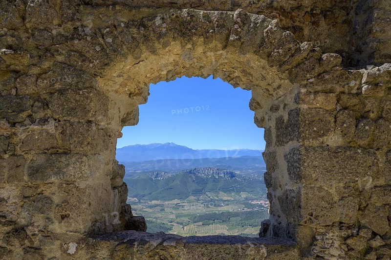 View from a stone arch, Quéribus Cathar castle, Cucugnan, Département Aude, France, Europe