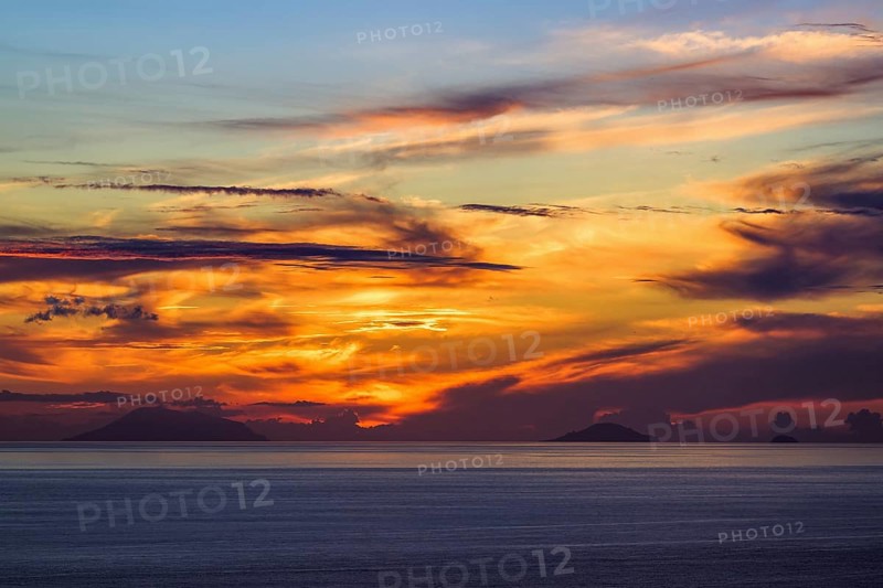 Sunset over Aeolian Islands from Nicotera, Aeolus, Sicily, Tyrrhenian Sea, Italy, Europe