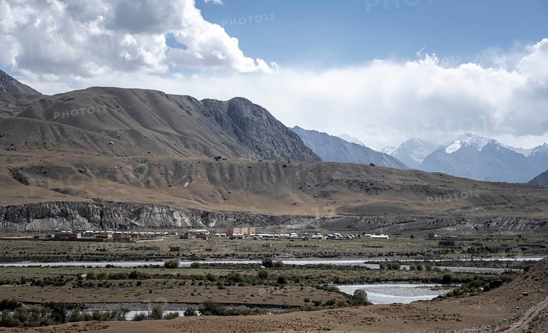 Town view, Engilchek river with village in mountain landscape, ghost town, Engilchek, Tian Shan, Kyrgyzstan, Asia