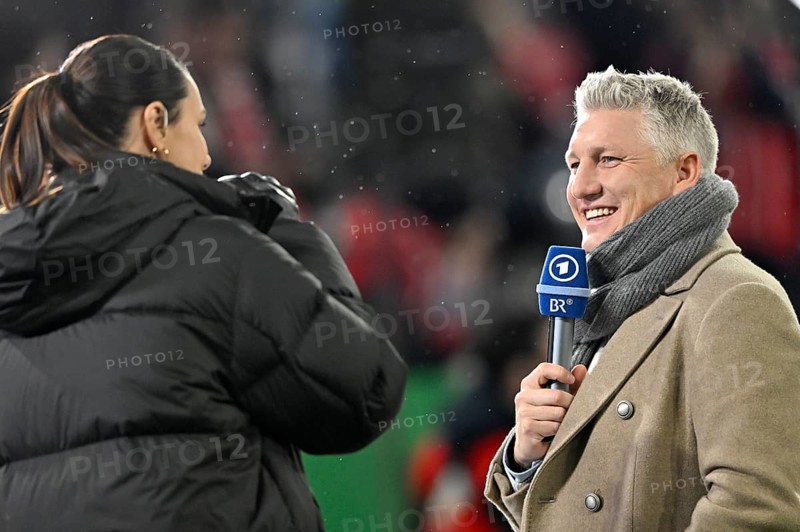 ARD presenter and reporter Esther Sedlaczek in an interview Microphone, microphone, logo, with TV pundit Bastian Schweinsteiger, DFB Cup round of 16, Allianz Arena, Munich, Bavaria, Germany, Europe