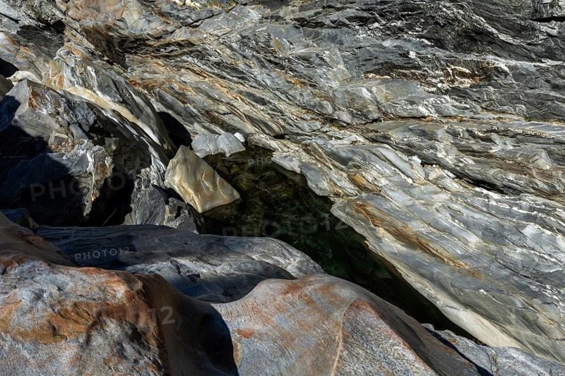 Rocks, granite rock formations in the Maggia River near Ponte Brolla, in the Maggia Valley, Valle Maggia, Canton Ticino, Switzerland, Europe