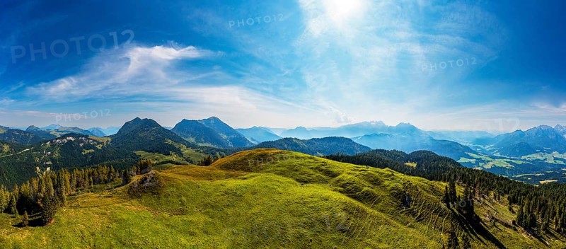 Drone shot, at the summit of the Taborberg with a view of the Osterhorn group and Dachstein massif, Salzkammergut, Salzburg province, Austria, Europe
