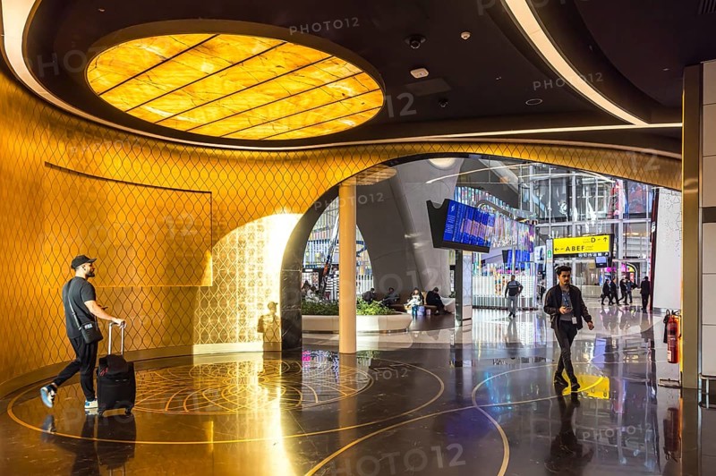 Abu Dhabi Airport, Zayed International Airport with passengers. Duty free shop. The new Terminal A has a capacity of 45 million passengers per year. Modern architecture. Abu Dhabi, United Arab Emirates, UAE, Asia