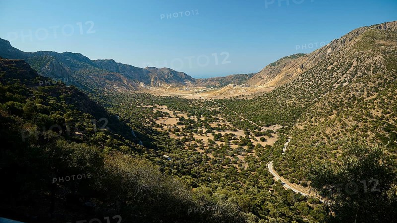 Wide valley with wooded slopes and mountains under a clear sky, volcanism, volcanic island, access to the crater, Nisyros, Dodecanese, Greek Islands, Greece, Europe