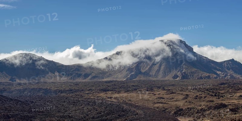 The summit of Montaña Guajara, also: Alto de Guajara, 2715m, crater walls, Caldera de las Cañadas, a huge volcanic cauldron, Teide National Park, Parque Nacional del Teide, at sunrise, Tenerife, Canary Islands, Spain, Europe