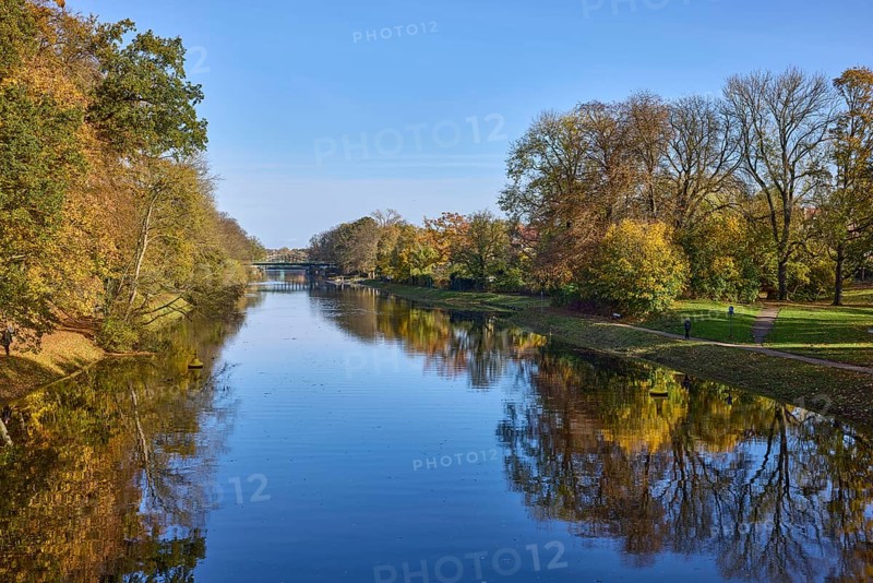 Canal Trave with autumnal trees, blue sky, Hanseatic city of Lübeck, Schleswig-Holstein, Germany, Europe