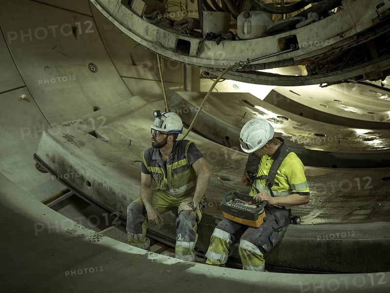 Workers in a tunnel section at the double-shield tunnel boring machine in section H53 of the Brenner Base Tunnel, Tyrol, Austria, Europe