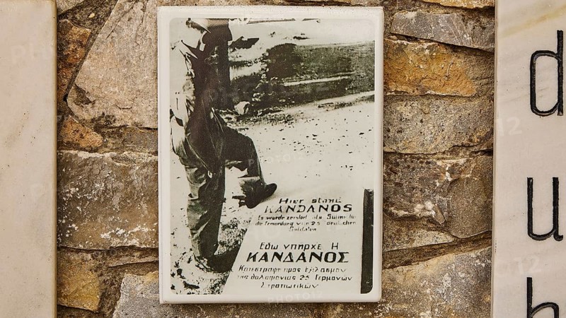 Historical black and white photo on a memorial plaque, attached to a wall, visit of the Federal President Frank-Walter Steinmeier in Kandanos on 31 October 2024, Federal President, Frank-Walter Steinmeier, memorial, war crimes, Nazis, Wehrmacht crimes, World War II, Kandanos, Southwest Crete, Crete, Greek Islands, Greece, Europe