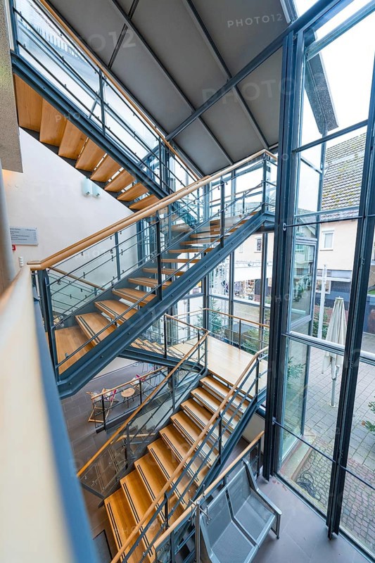 Modern, steel staircase in an urban building with large glass walls, Nagold Town Hall, Black Forest, Germany, Europe