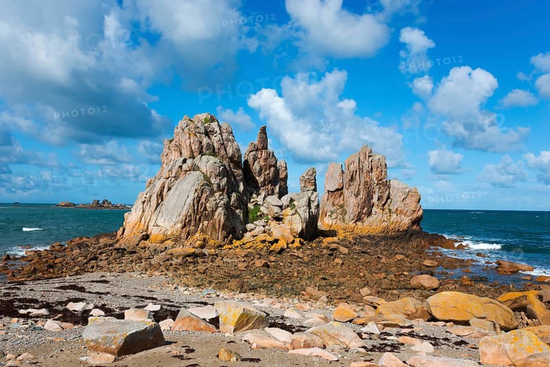 Rock formations on a sunny coast under a blue sky with clouds, Plage de Pors Scaff, Plougrescant, Côtes-d'Armor, English Channel, Brittany, France, Europe
