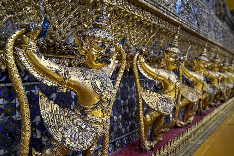 Golden sculptures of Garuda and Naga, Wat Phra Kaew, Temple of the Emerald Buddha, Bangkok, Thailand, Asia