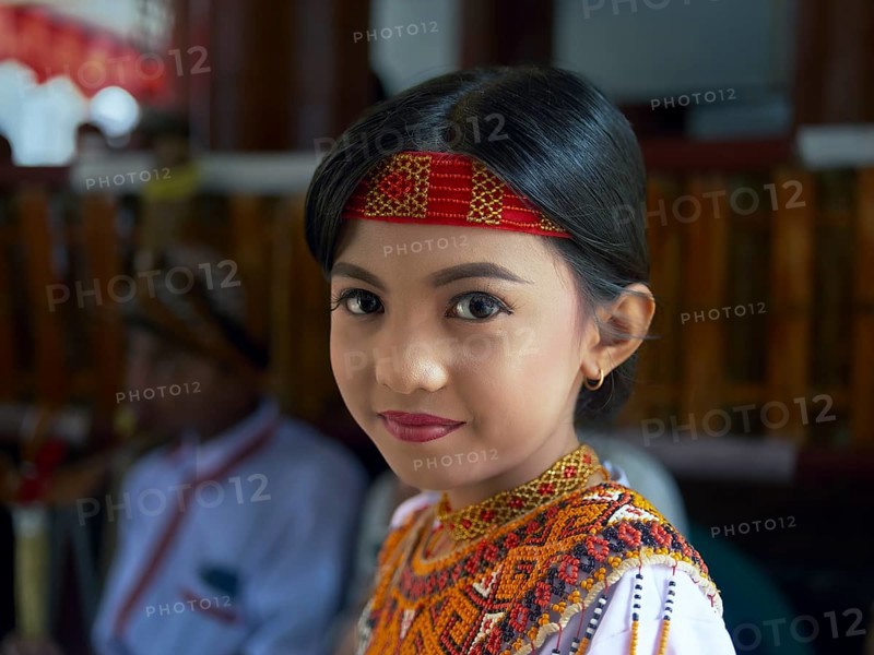 Toraja girl in traditional colourful clothing, portrait, Tana Toraja, Rantepao, Sulawesi, Indonesia, Asia