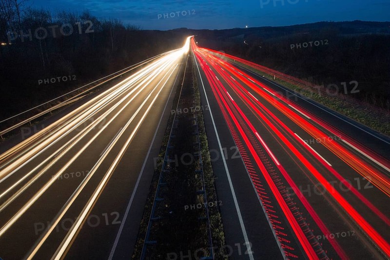 A7 Motorway, Autobahn, beside Kassel at night with light trails from the traffic headlights and taillights, Hesse, Germany, Europe