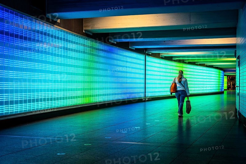 Passage under Essen's main railway station, connects entrances to the city and the main railway station, with the underground station, illuminated, LED wall, few people, Germany, Europe