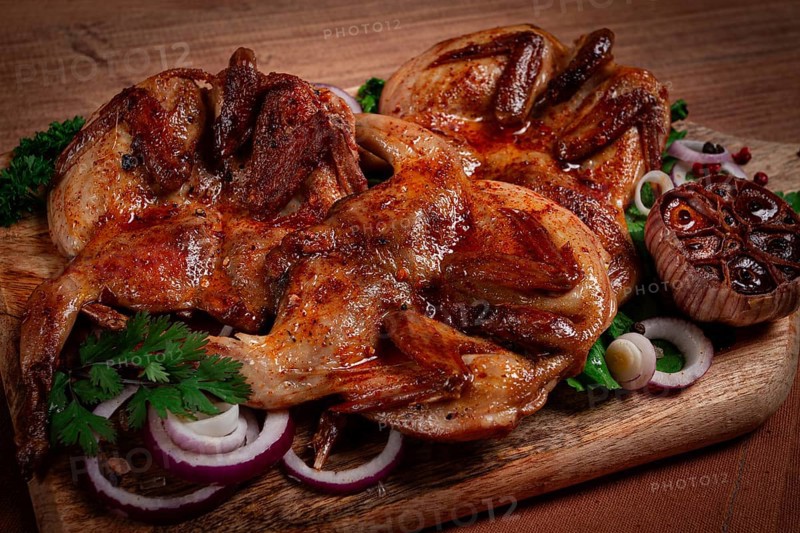 Fried, quail meat, tobacco (tapaka), with spices, homemade, no people
