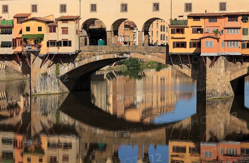 Ponte Vecchio and reflection in the river Arno, Florence, Tuscany, Italy, Europe