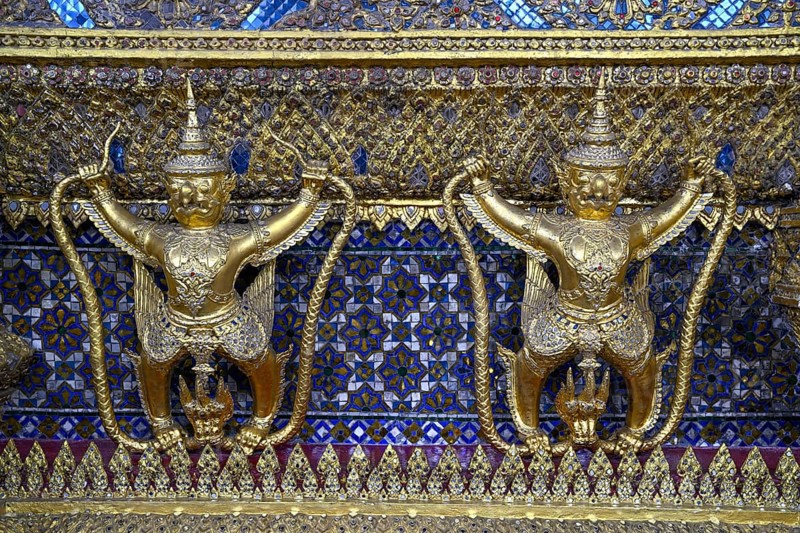 Golden sculptures of Garuda and Naga, Wat Phra Kaew, Temple of the Emerald Buddha, Bangkok, Thailand, Asia
