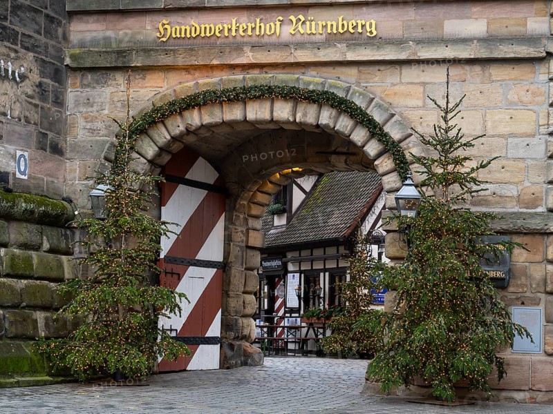 Christmas trees with fairy lights at the Königstor, Handwerkerhof, Nuremberg, Middle Franconia, Franconia, Bavaria, Germany, Europe