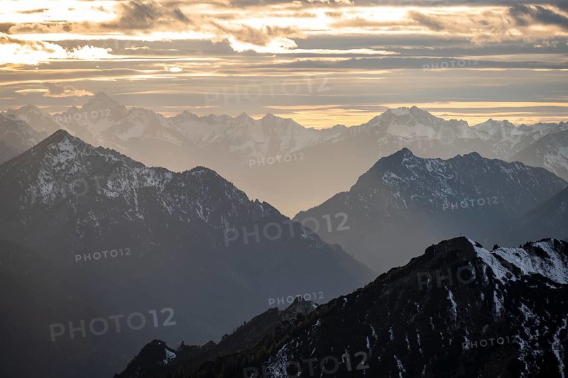 Mountain panorama with snow at sunset, in autumn, view from Kramerspitz, Bavarian Prealps, Bavaria, Germany, Europe