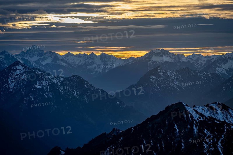 Mountain panorama with snow at sunset, in autumn, view from Kramerspitz, Bavarian Prealps, Bavaria, Germany, Europe