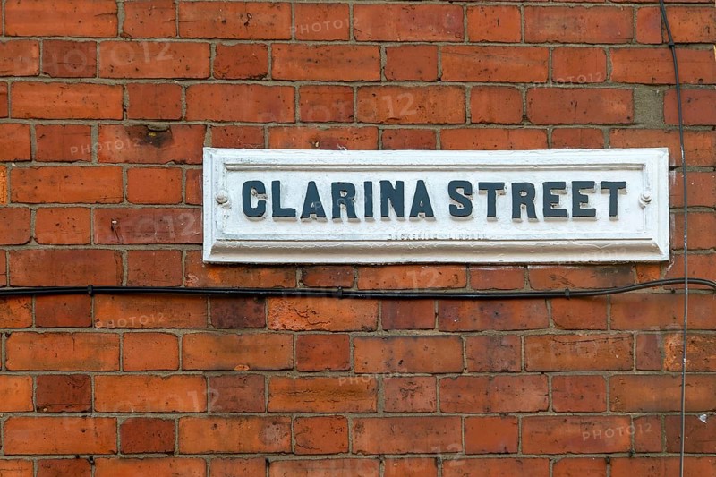 Victorian red brick terraced housing, street sign Clarina Street, inner city of Lincoln, Lincolnshire, England, UK
