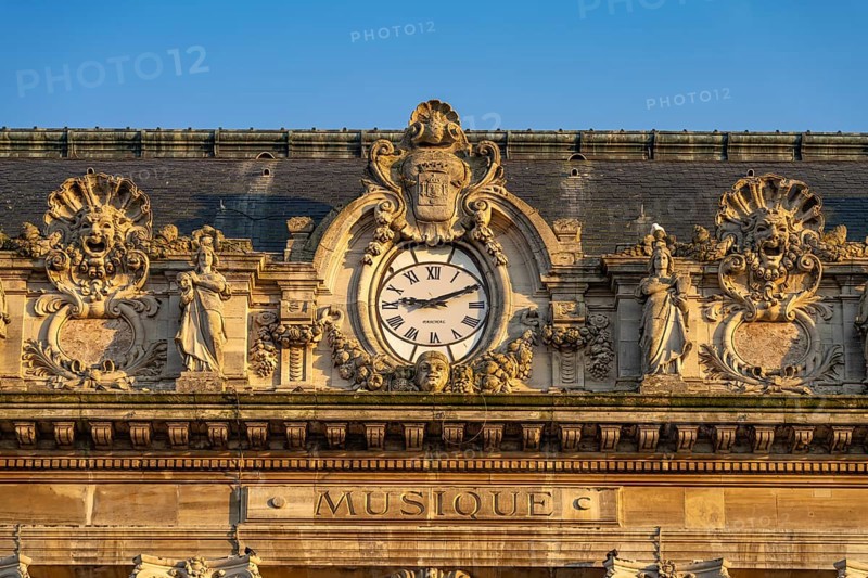 Clock and details of the theatre of Calais, France, Europe