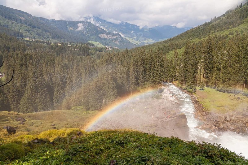 Krimml Waterfalls with rainbow. They have a total height of 380 metres (1, 247 feet) and are the highest waterfalls in Austria