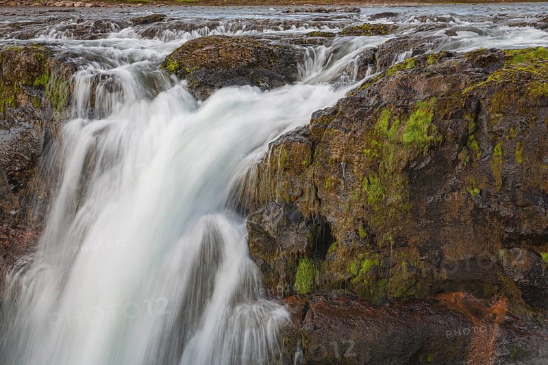 The Kolufossar waterfalls of the river Vididalsa consists of 3 falls the upper fall Efrifoss, in the middle Kolufoss and the lower fall Nedri-Kolufoss. Located in NW Iceland