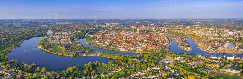 Aerial view over the river Trave and church towers in the old town of the Hanseatic City of Lübeck in spring, Schleswig-Holstein, Germany, Europe
