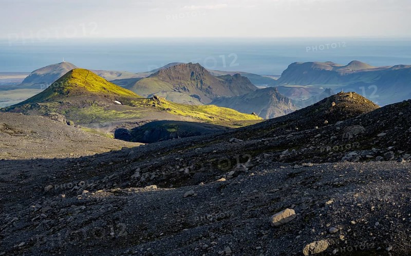 Volcanic mountain landscape overgrown with moss, atmospheric mountain landscape in the evening light, Pakgil, Iceland, Europe