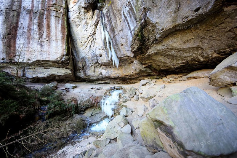 Frozen waterfall with icicles in the Gautschgrotte, Hohnstein, Saxony, Germany, Europe
