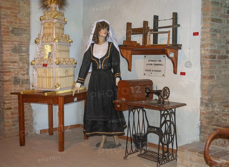 Interior with folk costume in museum in Aliano, the very poor village in southern Italy that the writer Carlo Levi depicted in his book Christ stopped at Eboli. The book became a bestseller and was filmed. Aliano, Matera District, Basilicata, Italy, Southern Europe, Europe