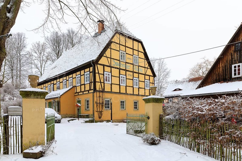 Residential building of the Zschonermühle in the snow, Ockerwitz, Dresden, Saxony, Germany, Europe