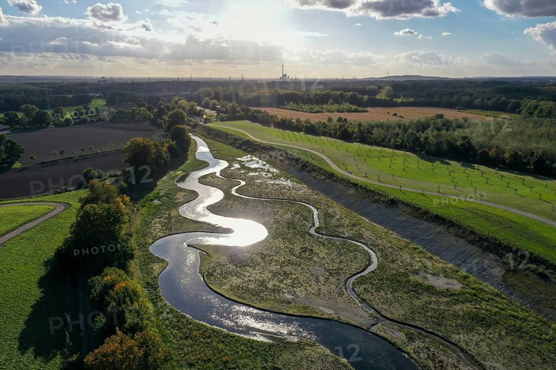 Recklinghausen, Castrop-Rauxel, North Rhine-Westphalia, Germany, Renaturalised Emscher, EMSCHERLAND construction project, a 37-hectare water and nature discovery park at the water crossroads of the Rhine-Herne Canal and the renaturalised Emscher on the city limits of Recklinghausen and Castrop-Rauxel. The ecological focal point at the confluence of the Suderwicher Bach and Emscher will also be a future garden for the International Garden Exhibition 2027. Before the renaturalisation, the Emscher river system was an open, above-ground wastewater channel, combined sewer with surface water and wastewater, Europe